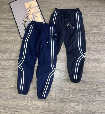 万针刺绣Logo耐克男裤夏季薄款速干裤子宽松新款跑步训练运动裤裤脚两穿拉链设计休闲长裤 Nike耐克高逼格！男子复古运动休闲梭织速干缩口长裤 裤脚拉链系列！耐克