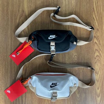 nike耐克折叠卡扣拼色包包多功能运动休闲腰包胸包手提包单肩包斜挎包 质感舒适面料，防刮耐磨 材质：尼龙 颜色：黑色 白色 尺寸：29X12X07 Cm Id：