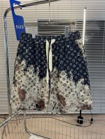 品名：Lv-24Ss新款王校长同款火烧云印花休闲宽松阔腿抽绳松紧短裤 颜色：图片色 尺码M-L-Xl 腰围 臀围 裤长 M 70 110 46 L 71 114