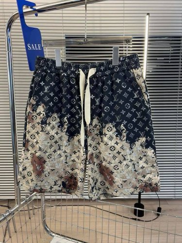 品名：Lv-24Ss新款王校长同款火烧云印花休闲宽松阔腿抽绳松紧短裤 颜色：图片色 尺码M-L-Xl 腰围 臀围 裤长 M 70 110 46 L 71 114