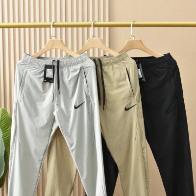 上新 清薄透气 夏季必备 钩子耐克Nike Nk男士男生女生春夏季轻薄拼接休闲裤3D剪裁锥子版型微收口运动长裤。 硅胶Logo轻薄柔软四面弹力冰丝空调布梭织料