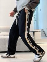 P140 品名：Gucci 古驰24Ss新款高街编织织带直筒休闲宽松运动卫裤 版型：宽松 颜色；黑色 尺码：M -L-Xl M 裤长99腰围74臀围104 L