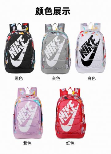 上新 款号:2518 高版本 Nike 潮流炫彩背包 尺寸 高46*宽32*厚18Cm 颜色 黑色 灰色 白色 紫色 红色 五大潮色 张扬你的个性 黑色 经典百