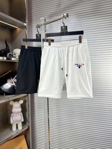 prad*普拉达 Ss25夏季新款男士休闲短裤，堪称百搭单品，涤纶束干面料 微弹性 松紧腰边抽绳设计，保型性好、低弹丝的构造使裤身弹性恰到好处，并且不易起皱！码