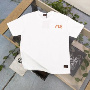 上新 款号：F657 2025新款Evisu福神家花图案大M海浪神龙不倒翁图案Logo字母印花休闲情侣短袖T恤，经典永远不会过时、人手必备款，230G纯棉精梳棉