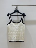 夏日新宠！Celine镂空针织系带背心，轻盈透气，海边度假必备。时尚镂空设计，优雅系带点缀，尽显沙滩风情，简约而不失格调。