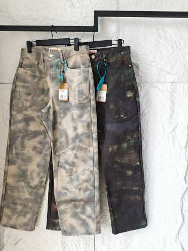 Stussy Fw24 Big Ol' Jean Stenpat Camo 多口袋宽松徽标贴片休闲牛仔裤 男女同款 独创迷彩纹路 融合混凝土裂痕与丛林苔藓的Dn