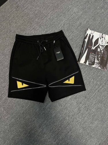 Fendi 芬迪小怪兽短裤 刺绣经典黄色眼睛设计.简单高级.时尚感强！ 整体采用定制面料，舒适度极好 手触感强烈，辨识度极高，完美品相工艺 前后标志点缀设计 采