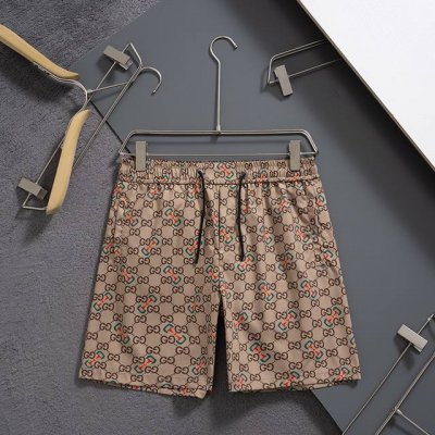 gucci 古驰 2025春夏季新款休闲高品质 速干裤梭织面料 沙滩裤 超高端品质3D数码印花工艺制作而成 原版复刻 整体提花最新字母联盟Logo图案设计 纤维