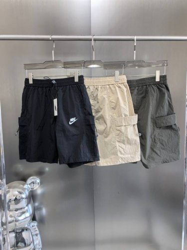 不控价 Nike 耐克2025出口韩国订单 冰丝速干工装大口袋短裤 运动休闲 时尚潮流 上身颜值超高 男女同款 情侣夏季必入款 本款采用85%锦纶12氨纶面料，