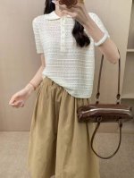 夏季新款简约翻领钩花镂空短袖针织衫 面料：空调丝 成分：：莱赛尔 60.5 棉 10.7 晴纶28.8 颜色： 黑色 白色