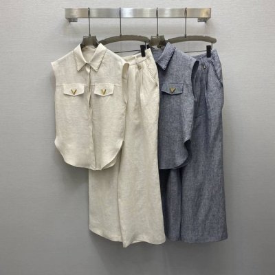 va*25Ss 气质翻领金属扣点缀飞袖背心衬衣九分裤套装 高级面料 颜色:图片2色 面料 亚麻面料 Smlxl
