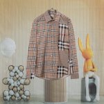 Burberry 巴宝莉 限量款拼接撞色长袖衬衣 各大网红同款衬衫 百分百纯棉衬衫面料 这款衬衫包含了Bbr所有衬衫经典格纹拼接而成 耗时剪裁 难度极高 报废率