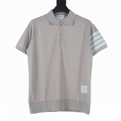Thom Browne Tb水波纹四杠压皮短袖polo衫 定织纺染采用410G 洗后455G ，全棉华夫格材质，手臂4Bar面料纯手工拼接，压皮工艺。定制红白蓝