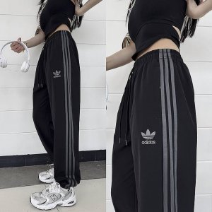 新款 上新 阿迪达斯Adidas三叶草运动速干九分长裤 条纹织带束腿裤， 三条杠的橙色织带，休闲中不失活力。 兼具舒适与型格，这款Adidas运动长裤，伴你从容