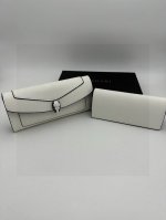 100 bvlgari 宝格丽蛇头子母折叠钱夹 生活不一定要很酷，但一定要有态度 备个钱包还是很有必要的 随身的包包里一定要放一个钱包，方便小物品归类 即使出门