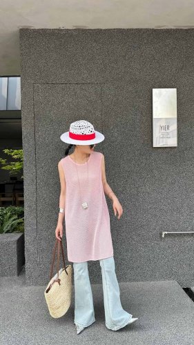 夏季新款简约中长款镂空侧边开叉针织 尺码 均码 面料：空调丝 成分：：莱赛尔 60.5 棉 10.7 晴纶28.8 颜色：白色 黄色 粉色 黑色