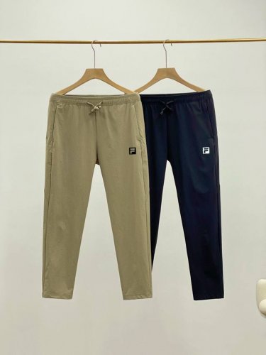 Fila斐乐户外系列防水防风休闲通勤长裤 卡其 黑色 M-5Xl 户外人的衣柜里总要有一条神裤，今天必须安利科隆同款户外冲锋裤，有了它，出行体验直接拉满。 立体