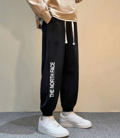 The North Face 北面Tnf侧拼花型宽松运动百搭宽松卫裤束脚裤休闲裤子 ｜无敌版型｜｜男女同款｜ 面料采用超高品质华棉 最大的优点就是亲肤性跟保形性