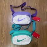 nike耐克大勾子多功能运动休闲腰包单肩包 斜挎包 颜色：绿色 紫色 尺寸：18X26X09Cm 肩带：120Cm 810