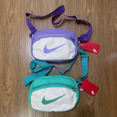 nike耐克大勾子多功能运动休闲腰包单肩包 斜挎包 颜色：绿色 紫色 尺寸：18X26X09Cm 肩带：120Cm 810