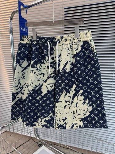 高品质 品名：Lv-23Ss 夏新款泼墨扎染提花老花牛仔休闲宽松阔腿抽绳松紧短裤 面料：牛仔 颜色： 牛仔蓝 尺码M-L-Xl 腰围 臀围 裤长 M 70 11