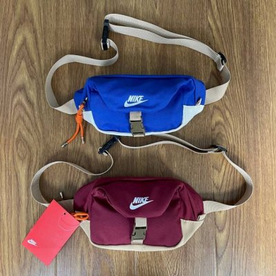 Nike耐克折叠卡扣拼色包包多功能运动休闲腰包胸包手提包单肩包斜挎包 质感舒适面料，防刮耐磨 材质：尼龙 颜色：蓝色 红色 尺寸：29X 7 Cm Id：803