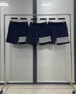 短裤 Tb春夏四条纹尼龙短裤 经典四杠 定位手工缝制 两侧贝壳纽扣开衩设计 纯棉针织螺纹腰头 松紧弹力按压式铜扣 暗格纹尼龙材质 内里纯棉半里 Size：1 2
