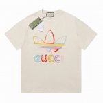 上新款号：G738 Gucci古驰彩绘阿迪联名印花圆领短袖T恤 Gucci短袖 面料：采用32支260G精棉双纱面料，不起球 不缩水 不褪色，同缸定染32支双股