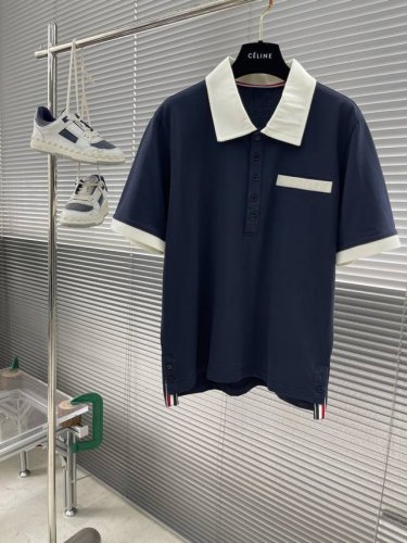 Tb 25Ss新款撞色翻领polo 两个经典色的独特个性慵懒风款式，宽松舒适且百搭；舒适运动，适合各种身材；精湛车线缝制体现良好车缝工艺。 男女同款 码数：0