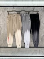 prada 普拉达，2025春季新品，专柜同步有售，原单狠货，时尚休闲裤，采用进口聚酯纤维尼龙透气面料，顶级印花工艺字母图案装饰Logo，原版五金辅料装饰，档次