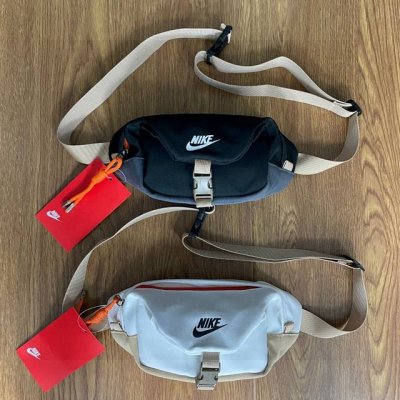 Nike耐克折叠卡扣拼色包包多功能运动休闲腰包胸包手提包单肩包斜挎包 质感舒适面料，防刮耐磨 材质：尼龙 颜色：黑色 白色 尺寸：29X 7 Cm Id：803