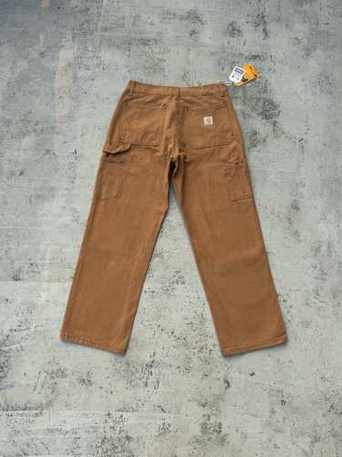K020 Carhartt Wip卡哈伐木工日系工装风牛仔裤 定制原版Logo扣，Ykk拉链门襟，顺滑易拉！ 很多位置都有套结加固，车工扎实！ 整体剪裁采用了立