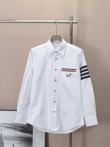 Tb牛津纺小狗刺绣黑色四道杠长袖衬衫 新款 Thom Browne 汤姆布朗.Tb衬衫经典胸前刺绣小狗红白蓝织带衬托 袖子黑色四道杠长袖衬衫 扣子采用红白蓝标志