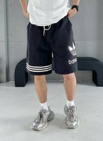 品名：Balencigag 三叶草 联名款 25Ss 拼接运动破洞 剪花工艺 内里网眼短裤五分裤 面料：梭支 颜色： 黑色 尺码M-L-Xl 腰围 臀围 裤长