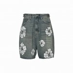 Denim Tears 25Ss 棉花印花泥染做旧牛仔短裤 选用430克100%纯棉15盎司赛络纺牛仔布面料 当街头潮流对话文化遗产 每一道泥染痕迹都是对历史