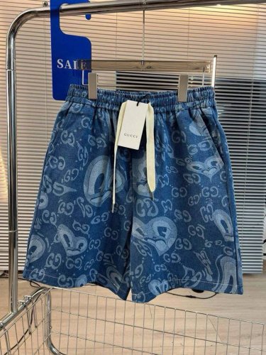 品名： Gucci 24Ss夏新款 液体爱心鬼脸激光印花休闲宽松阔腿短裤 面料：水洗牛仔 颜色： 牛仔蓝 尺码M-L-Xl 腰围 臀围 裤长 M 70 46 L