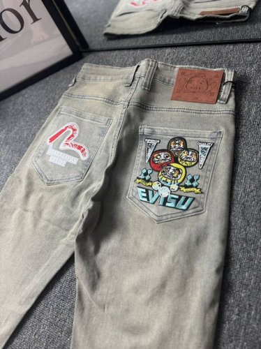 oc-617 Evisu脏脏做旧牛仔长裤Evisu 福神牛仔裤 情侣款特供中山原厂原浆牛仔，面料环保，做旧拼接元素，和带有欧美风格的腰果花组合，与M的完美结合、