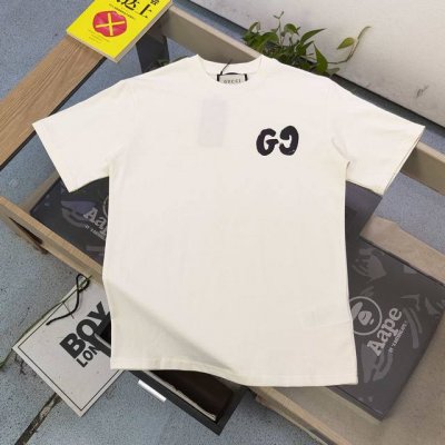 款号 Xd8879 高版本 2025新款Gucci古驰涂鸦双G字母图案Logo印花休闲情侣短袖T恤 独一无二的活性环保面料染色 32支双纱精梳纯棉爽滑手感 纯棉