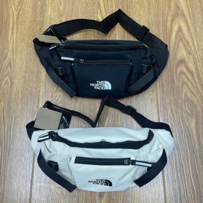 the North Face Tnf北面包包多功能运动休闲腰包胸包手提包单肩包斜挎包 材质：尼龙 颜色：黑色 米白色 尺寸：25X17X10 Cm Id：181