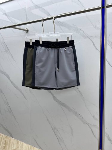 prada*普拉达 2025春夏最新款短裤，定制锦棉顶级品质，定制面料时尚感十足，间色拼接，经典胶条Logo凸显品牌简约大方得体，搭配休闲简单时尚潮流可以，十分