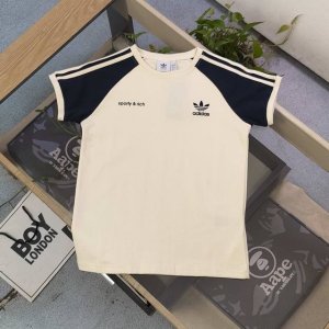 上新 款号：Dg8604 205新款Adidas阿迪达斯三叶草刺绣小标Logo绣花拼接女款短袖T恤，全新力作，解锁运动时尚新高度！米白主调邂逅深邃蓝袖，碰撞出别