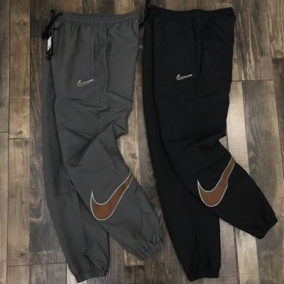 25夏款 发130 新品上新 Nk环形Logo织带拼接情侣款运动休闲裤子 定制织带防风面料非常舒适亲肤透气 侧边Nk刺绣内里抽绳完美演绎 内里包边到底呵护你的全