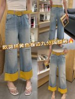 主推爆款大货出 欧货大爆款卷边牛仔阔腿裤，邂逅随性自在。浅蓝色牛仔 ，邂逅明媚春日，自带清新氛围。裤腿处个性的黄色卷边，与破洞元素相呼应，碰撞出不羁火花。九分长