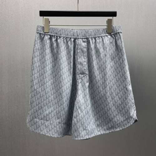 cd 蓝灰色桑蚕丝和棉质混纺短裤 Size S-Xl 这款短褲突量 Dior 経典的 Oblique 印花。采用藍色桑蚕丝和棉质混纺提花面料精心制作，运动风