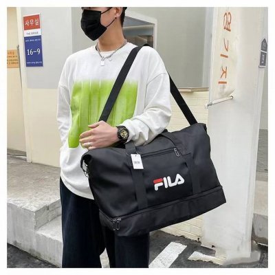 Fila 斐乐 大容量牛津布防水情侣运动旅行斜挎手提多功能包 颜色 ：黑色，宝蓝，粉色 尺寸 ：上口64*高33*底46.5*23.5Cm 详情看尺寸图 采用优