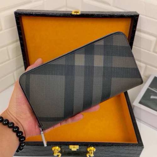 Burberry巴宝莉格纹长款钱夹钱包 全皮 原单品质 实物拍摄 头层皮 小号型号：666040进口皮 荔枝纹皮 巴宝莉精致的手工艺制作，采用100%进荔枝纹皮