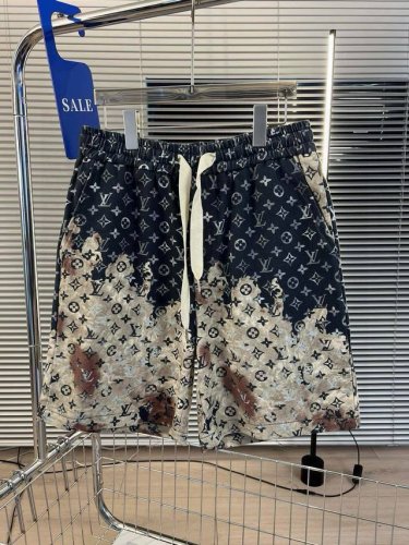 品名：Lv-24Ss新款王校长同款火烧云印花休闲宽松阔腿抽绳松紧短裤 颜色：图片色 尺码M-L-Xl 腰围 臀围 裤长 M 70 110 46 L 71 114