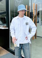 pmiumiu 高定款 涂鸦立体印花男女同款长袖衬衫 面料采用棉优质面料 印花细节效果出来更加非常完美 面料上身柔软舒适 极其细腻 手感扎实润滑且柔软 拥有既织