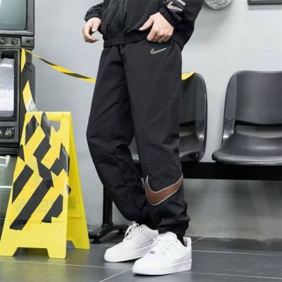 钩子Nike 2025耐克刺绣Logo夏季柜子爆款二色休闲运动轻薄速干弹力裤 内里网状款 微收口版型满足日常搭配 进口锦纶天丝速干弹力面料柔软透气舒适 速干裤的